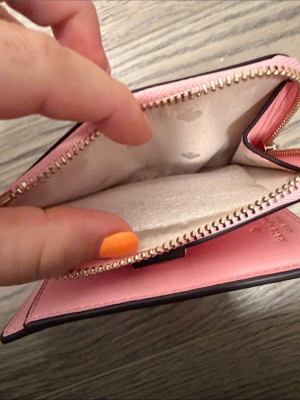 kate spade Pink Compact Zip Wallet with Gold Logo